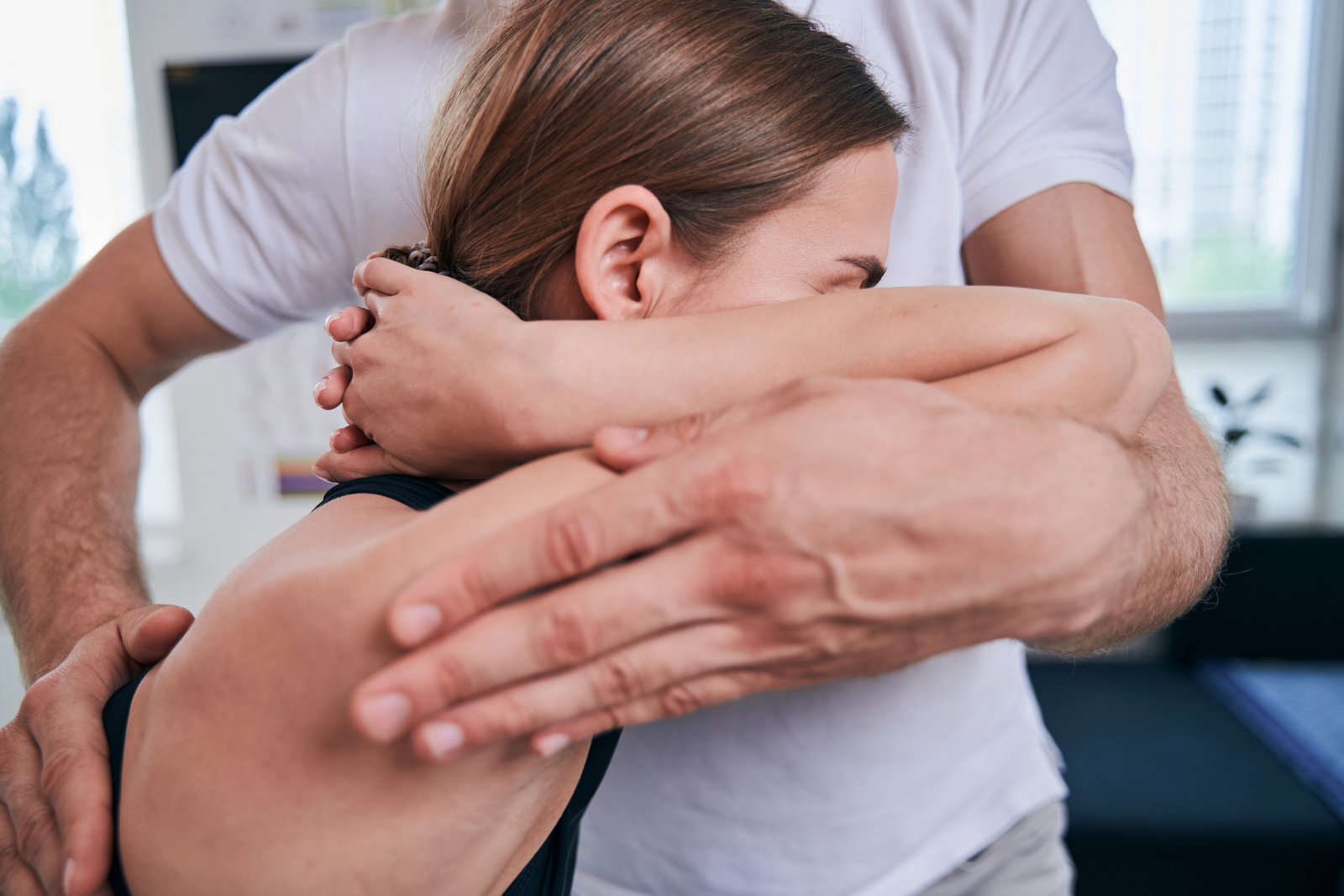 unrecognized man acupressure specialist examining utc